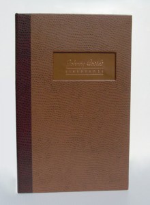 custom menu cover in Ostrich with copper inset within window